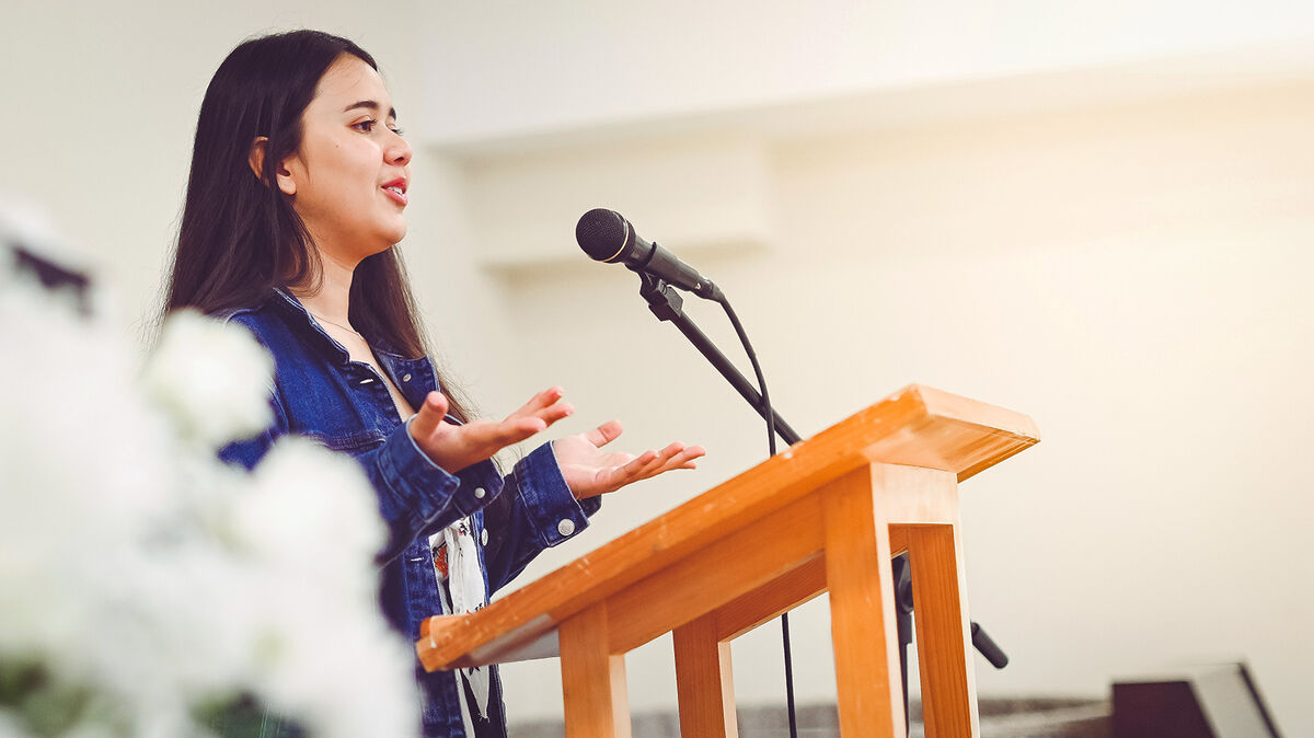 woman giving commemorative speech