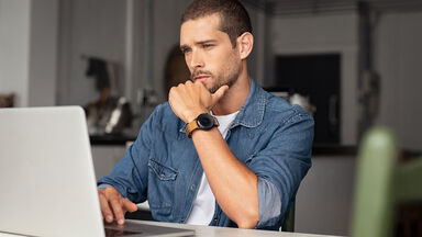man writing resignation letter man writing resignation letter
