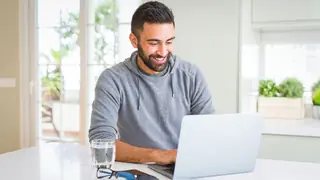 man writing letter of interest