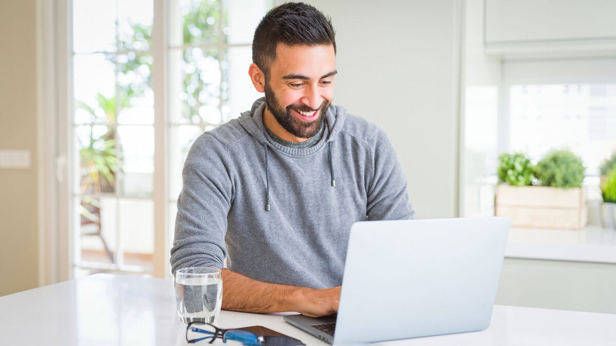 man writing letter of interest