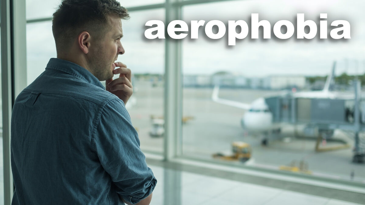 Man at airport with phobia of flying aerophobia