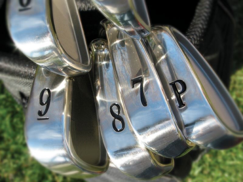 Golf irons in a golf bag