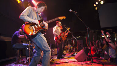 Rock band performing on stage