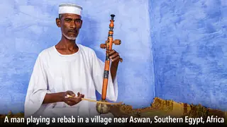 Man playing rebab instrument Egypt