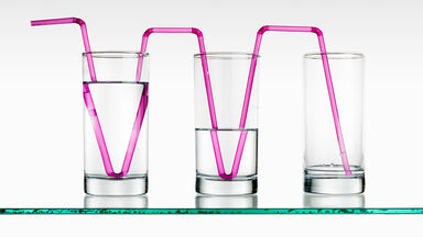 Glasses of water with straws