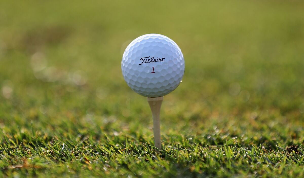 Titleist golf ball on a tee