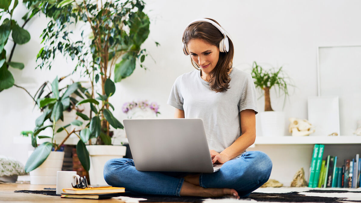 woman writer with headphones on
