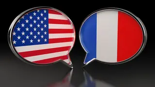 USA and France flags with Speech Bubbles