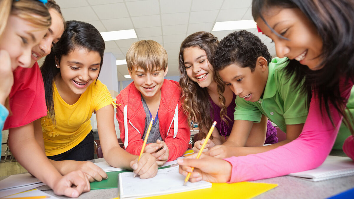 students doing writing game in class