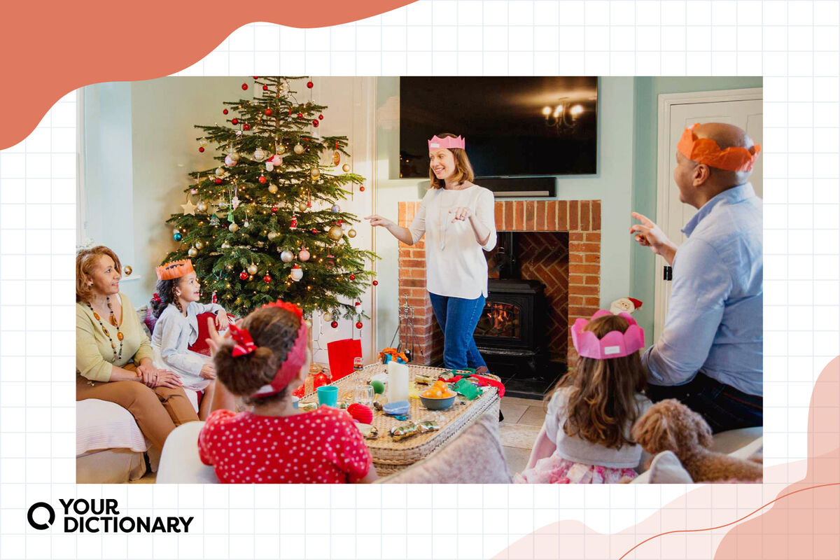 family playing Christmas charades game