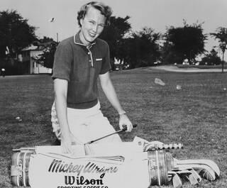 Mickey Wright with golf bag