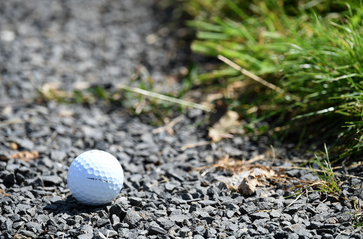 golf ball on cart path