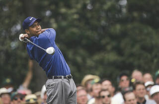 Tiger Woods swings at Masters