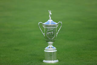 U.S. Open trophy on golf course