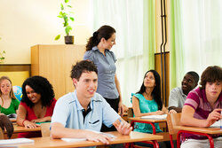 teacher in discussion with students