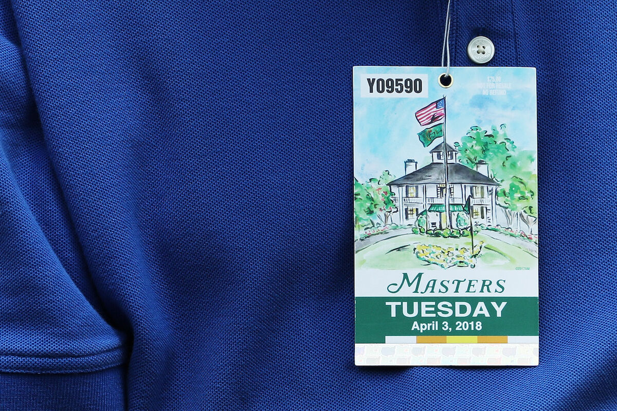 2018 Masters ticket over blue shirt