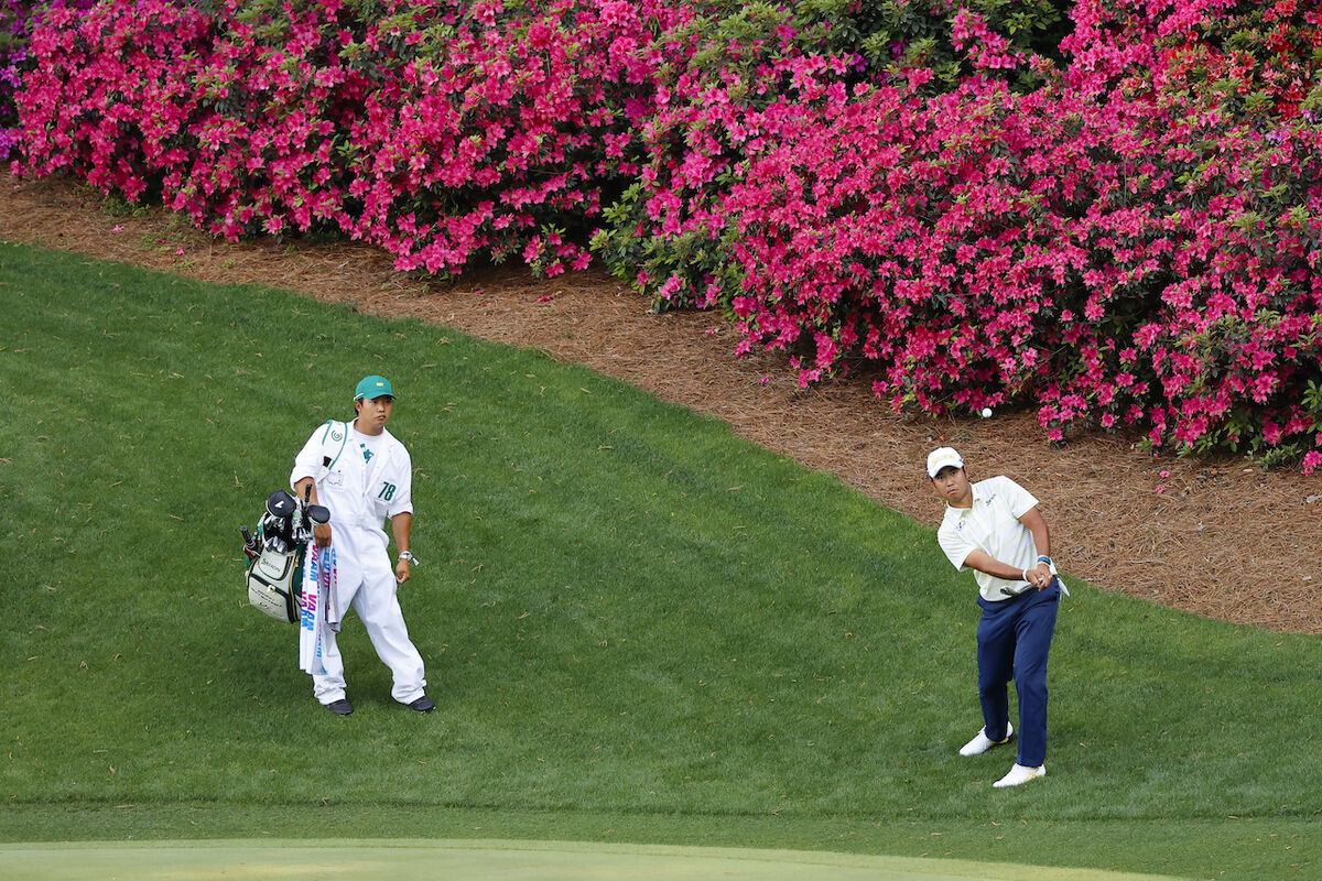 Hideki Matsuyama chipping at 2021 Masters