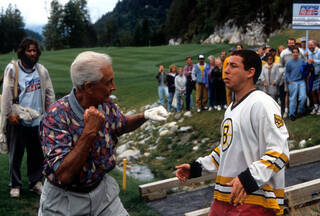 Happy Gilmore and Bob Barker altercation on a golf course