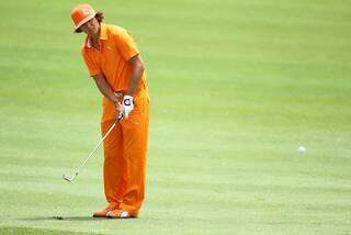 Rickie Fowler wearing head-to-toe orange