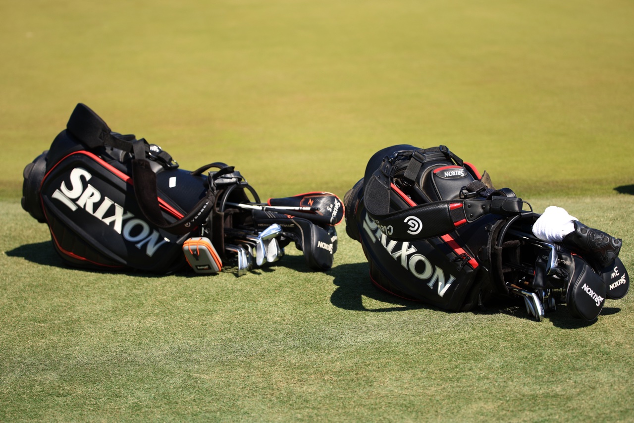 Two Srixon bags on the ground