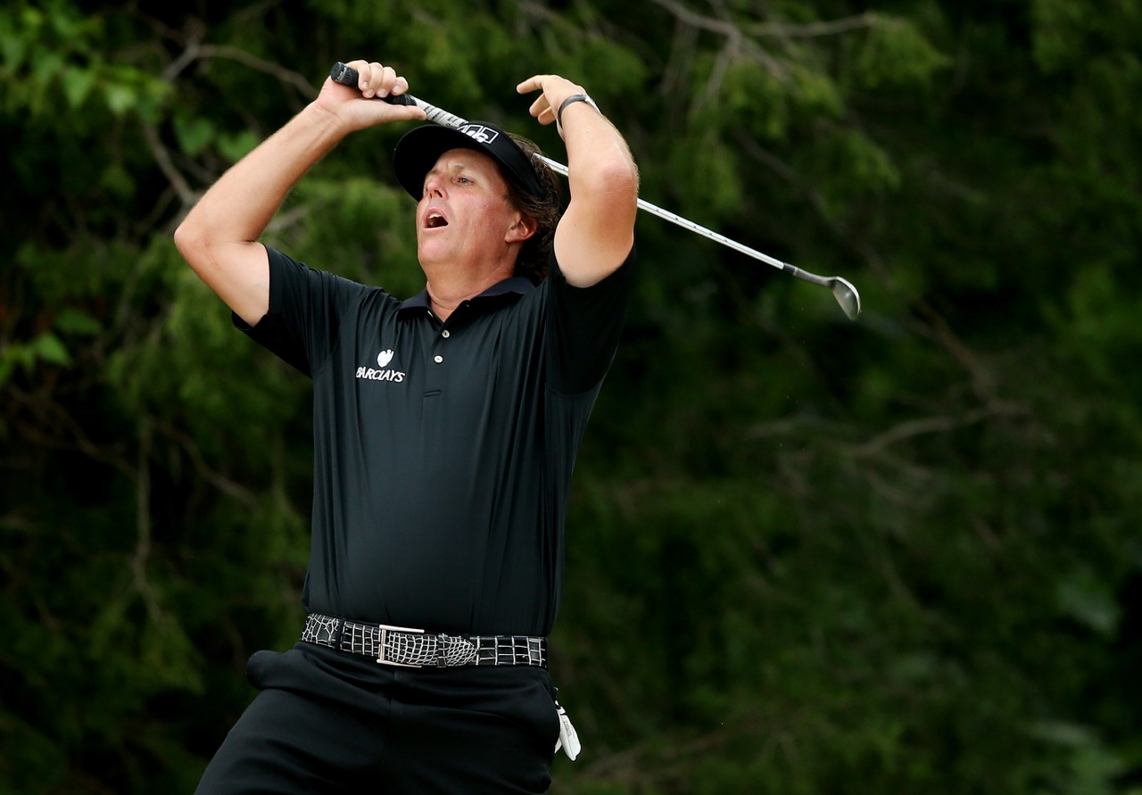 Phil Mickelson reacts in disbelief