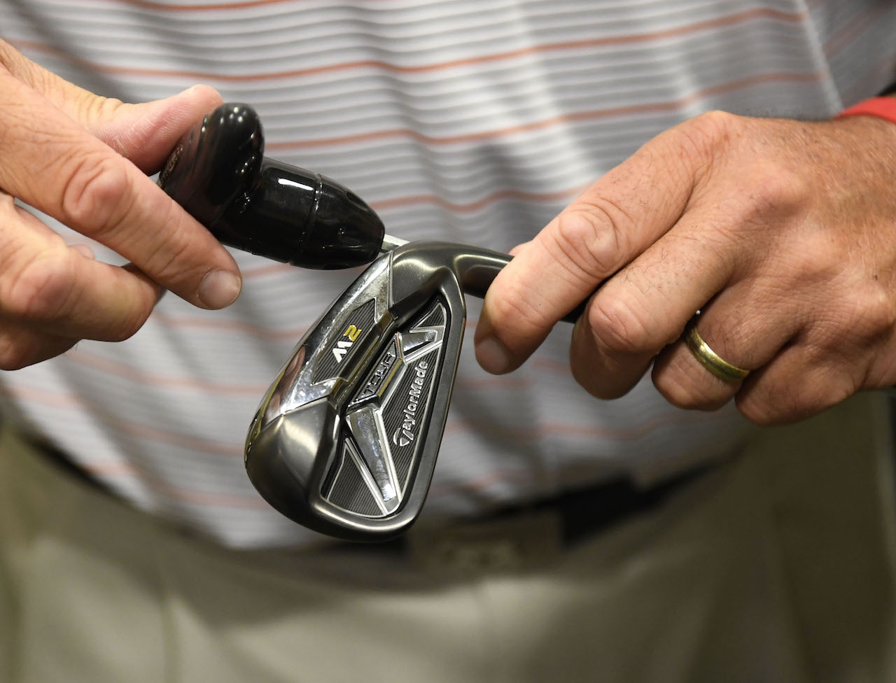 Golf club fitting with tool