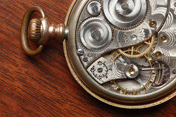 complex inner workings of pocket watch