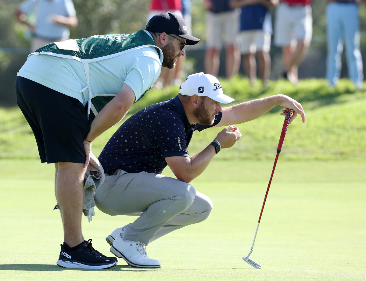 Caddie Sam Matton and player Jordan Smith