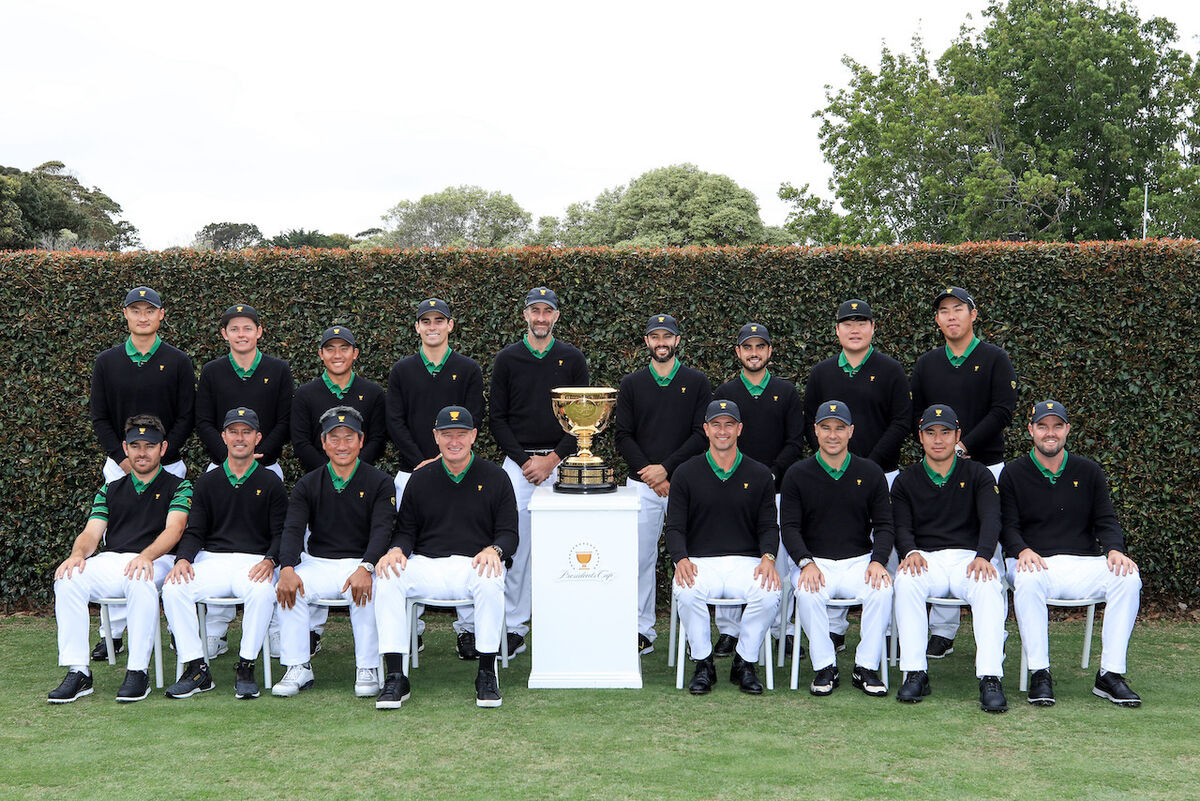 International team photo with trophy