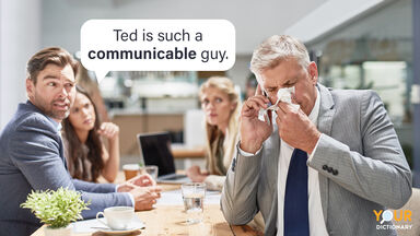 Businessman blowing his nose colleagues look use of word Communicable