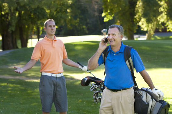 Golfer on his cell phone mid-round