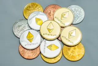 Close-Up Of Cryptocurrency On Table