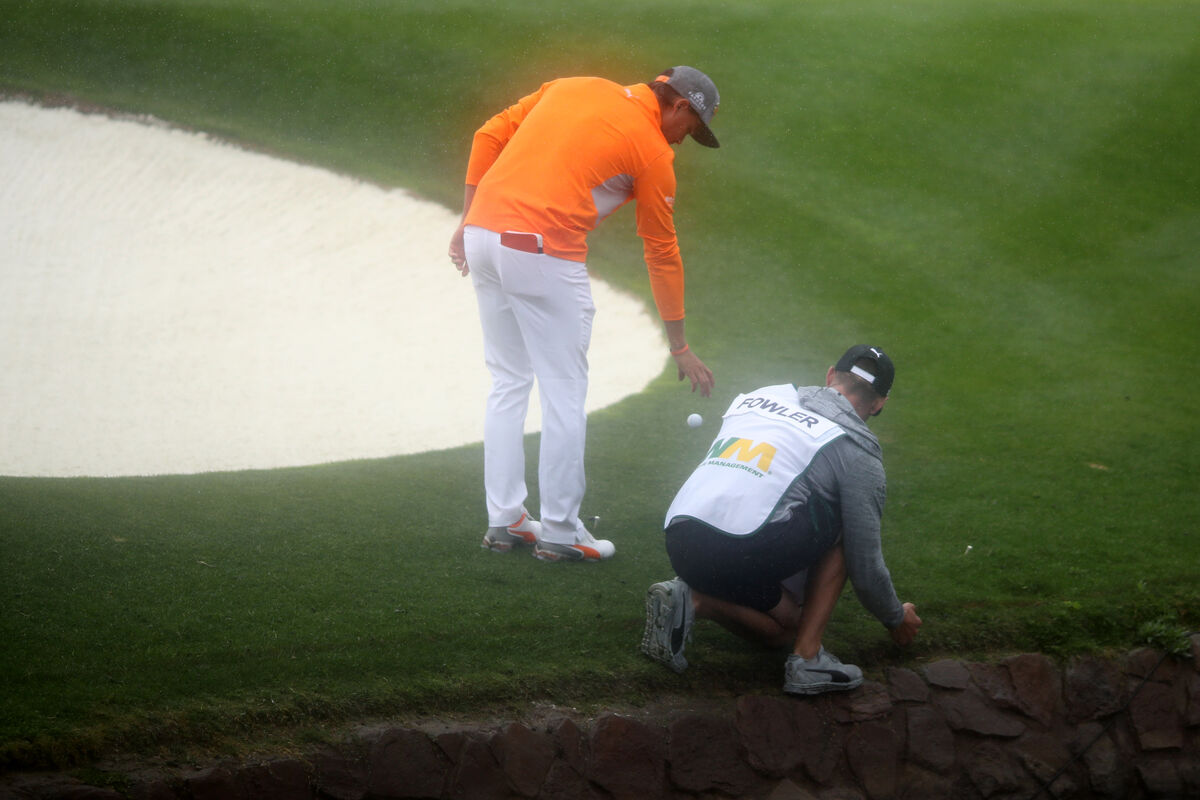 Rickie Fowler drops on a steep slope