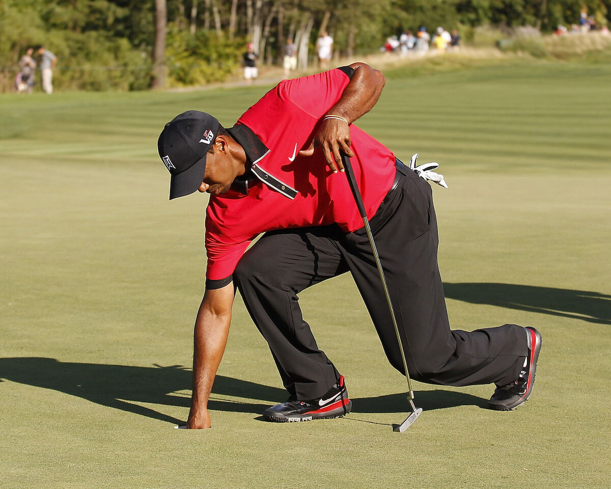 Tiger Woods dealing with back injury