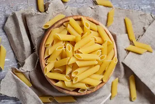 Uncooked Italian penne pasta