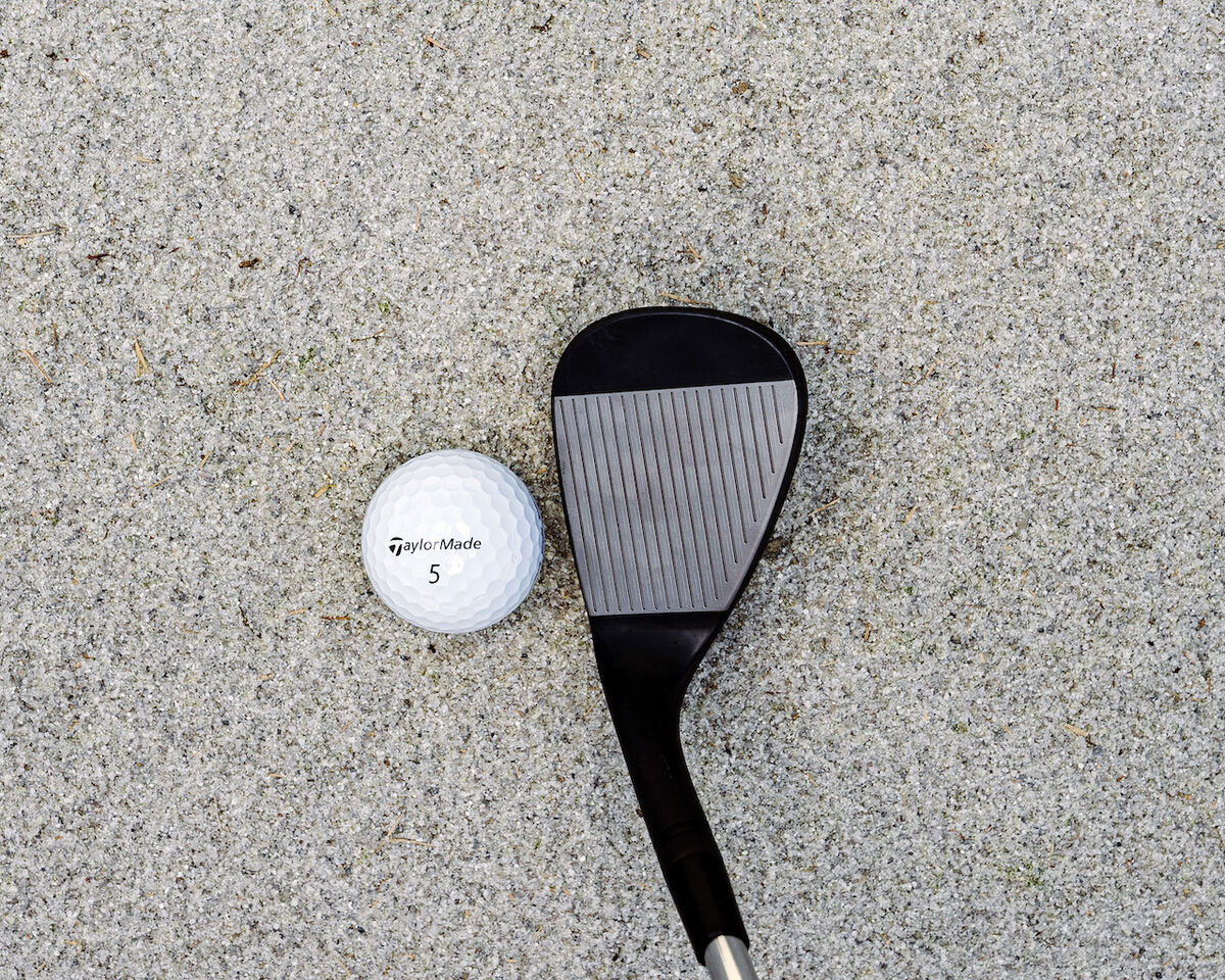 wedge in sand trap with ball