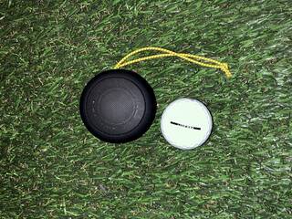 Size comparison of Team8 S speaker to a golf ball