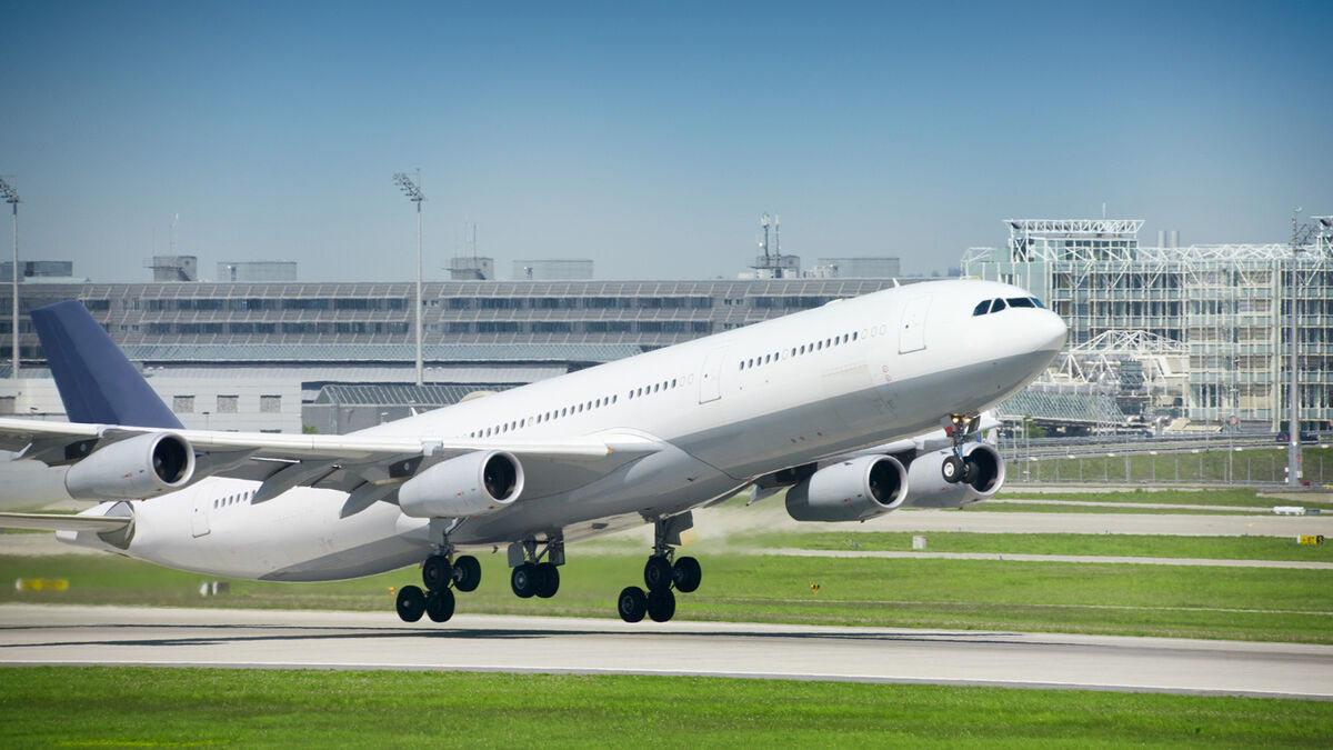 Jet airplane taking off at airport