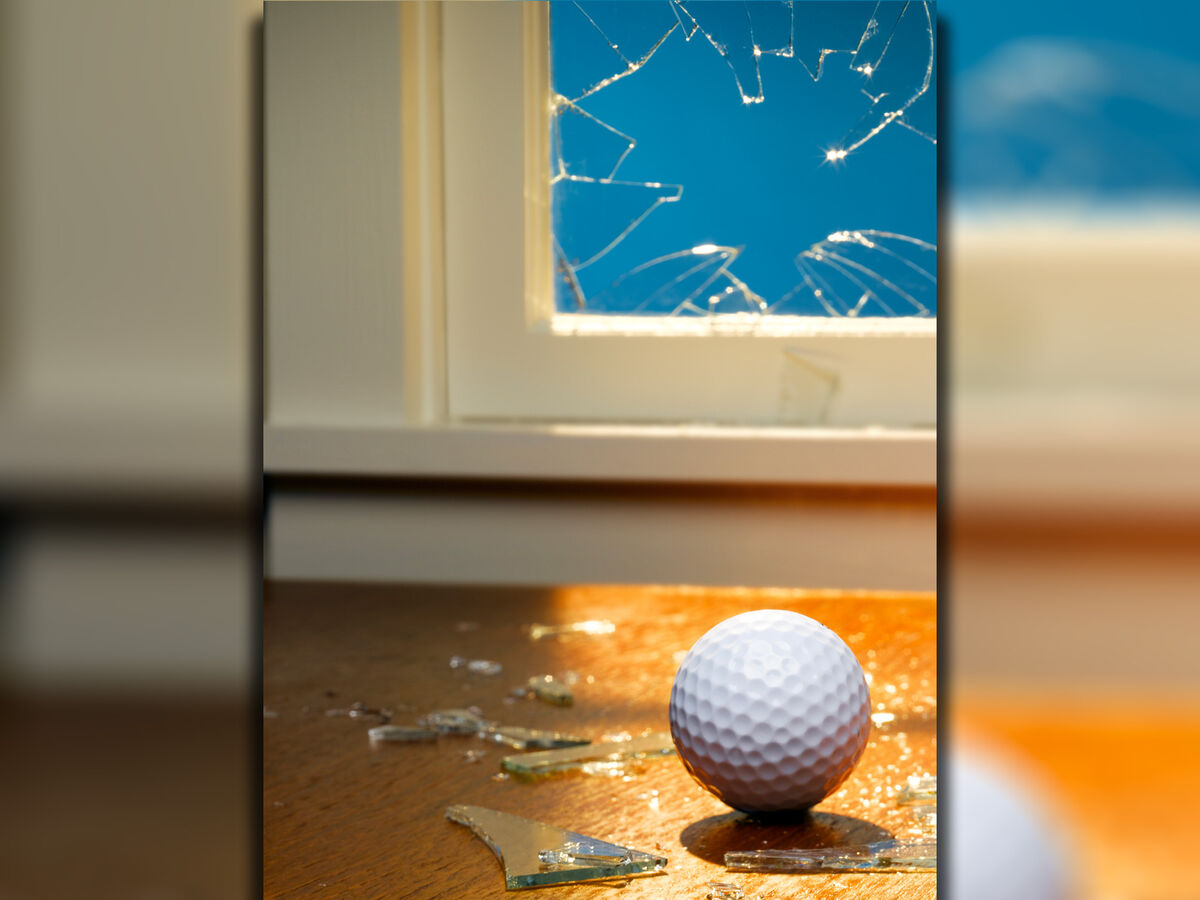 Golf ball crashes through window onto dining room table