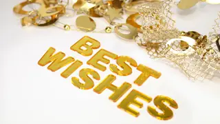 best wishes in gold lettering