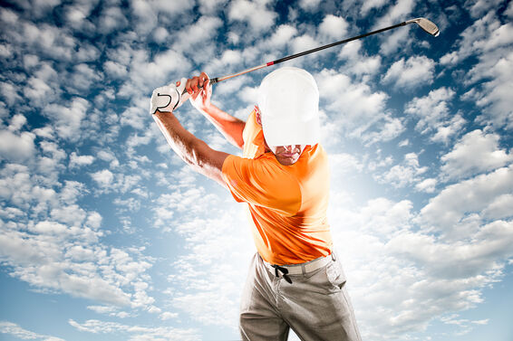 Golfer at the top of his backswing