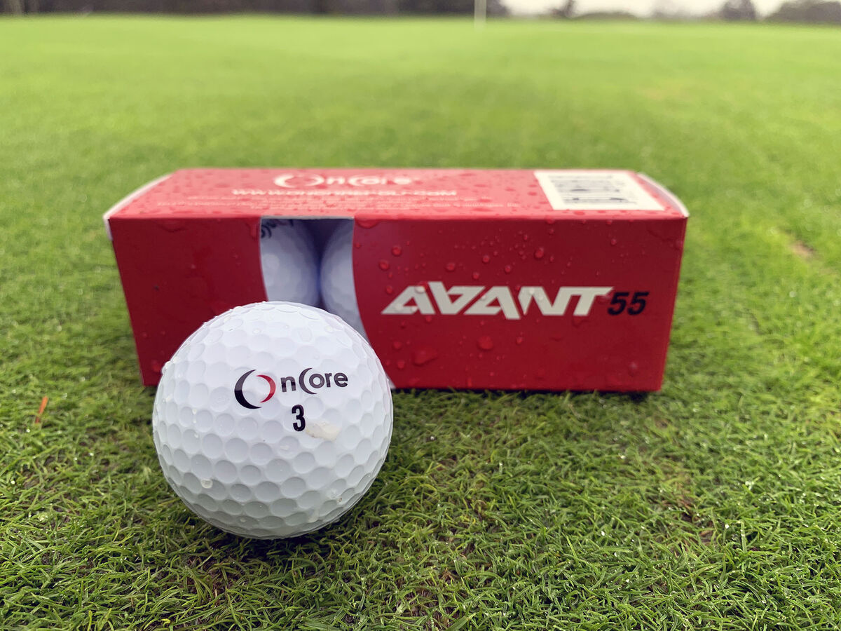 OnCore AVANT 55 golf ball and sleeve on a putting green