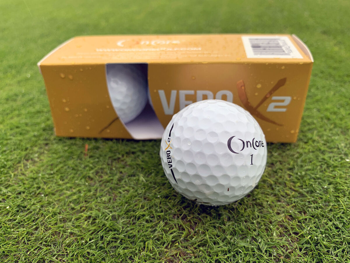 OnCore VERO X2 ball and sleeve on a putting green