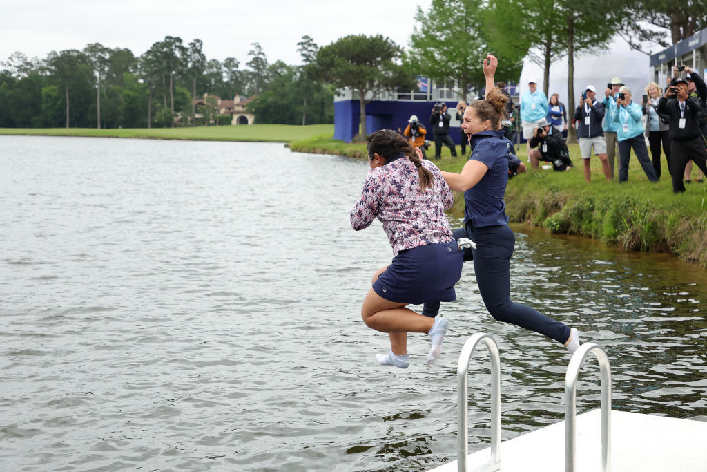 Lilia Vu jumps into the water after winning the 2023 Chevron Championship