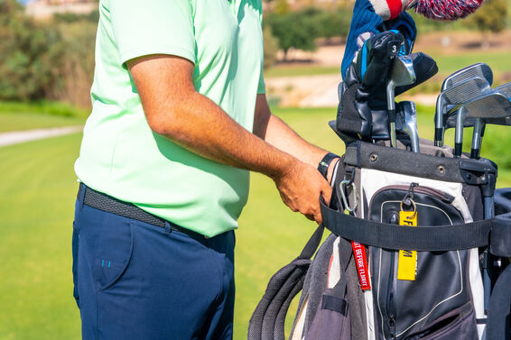 14-divider golf bag loaded on a cart