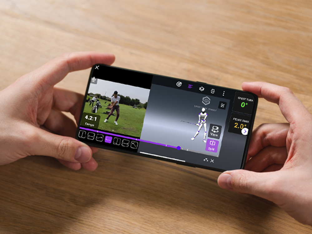 Golfer looking at their swing on a phone using Sportsbox AI