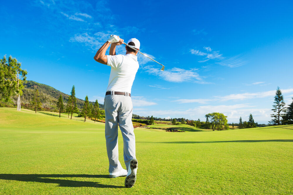 Golfer in a perfectly balanced finish position