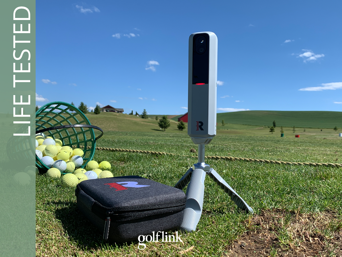 Rapsodo MLM2PRO launch monitor with the case during GolfLink testing at a driving range
