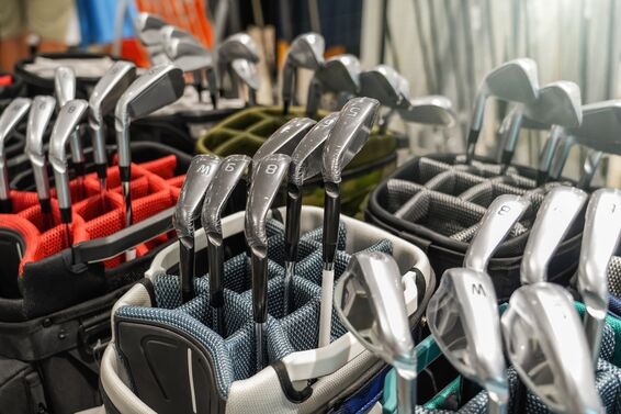 Various golf irons in a golf shop