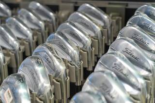 New golf irons in a retail store
